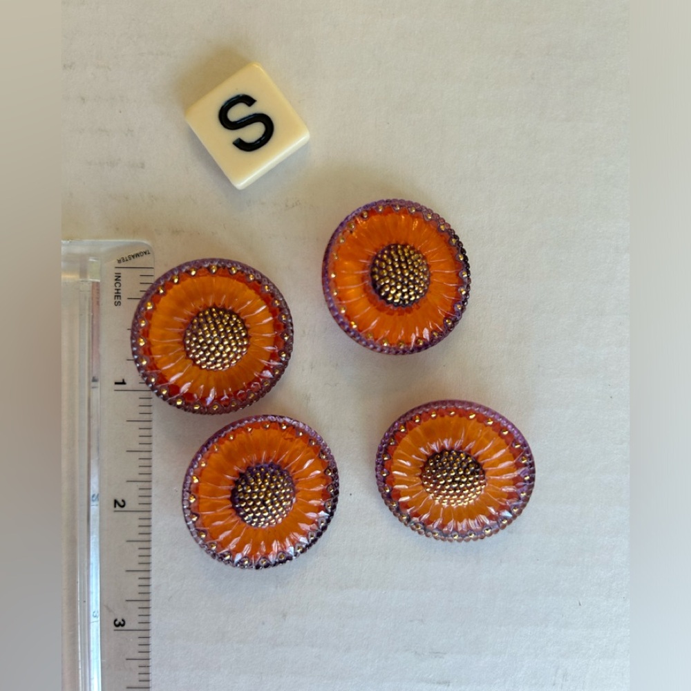 4 Vintage glass buttons